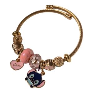 Gold-Tone Charm Bangle Bracelet with Pink Accents and Stitch  Character Charm